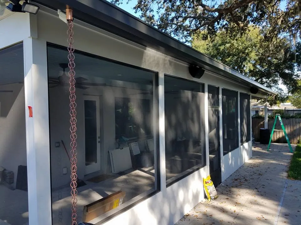 Copper rain chain screened lanai black box gutter, Sanford